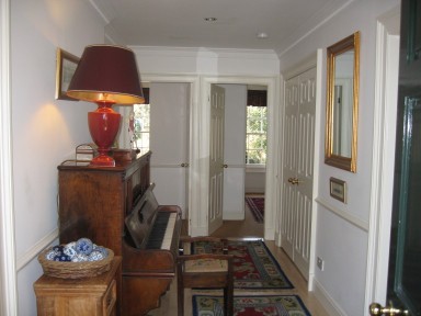 Peacock Cottage - The hallway and piano - larger image